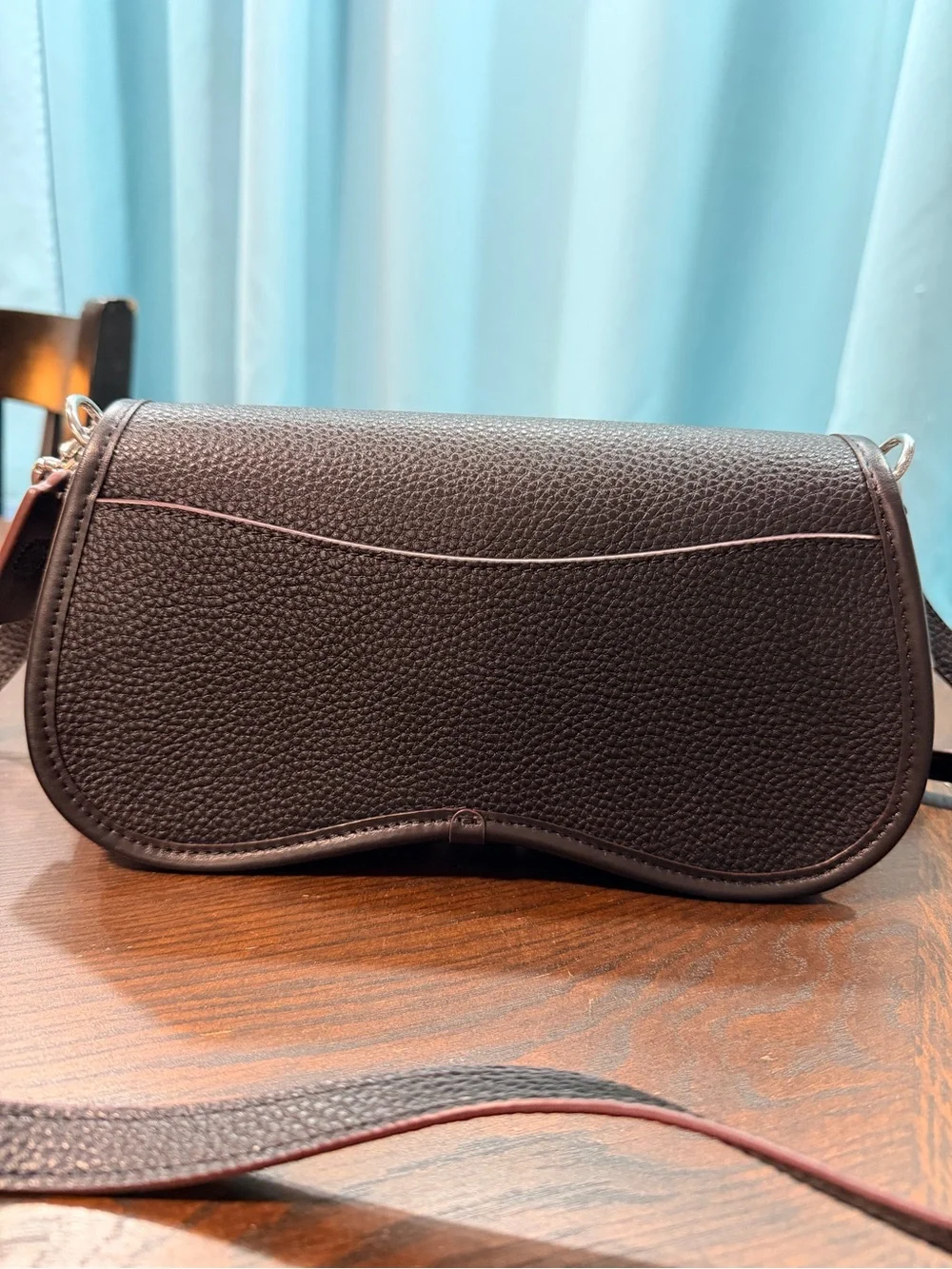 Coachtopia Wavy Dinkey black Pebble Leather Crossbody with acrylic chain.